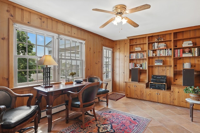 1449 Riverview Ave, Peekskill, NY 10566 - office space featuring healthy amount of natural light, ceiling fan, light tile patterned floors, and wooden walls