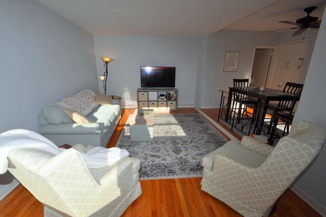 66 Rockledge Rd Unit 1B, Hartsdale, NY 10530 - living room with wood finished floors, a ceiling fan, and baseboards