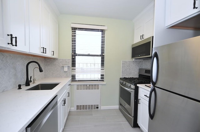 66 Rockledge Rd Unit 1B, Hartsdale, NY 10530 - kitchen with plenty of natural light, radiator heating unit, stainless steel appliances, and a sink