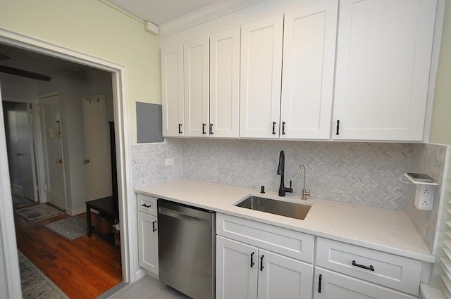 66 Rockledge Rd Unit 1B, Hartsdale, NY 10530 - kitchen with backsplash, white cabinets, stainless steel dishwasher, and a sink