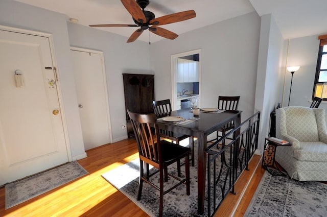 66 Rockledge Rd Unit 1B, Hartsdale, NY 10530 - dining room featuring ceiling fan, baseboards, and light wood finished floors