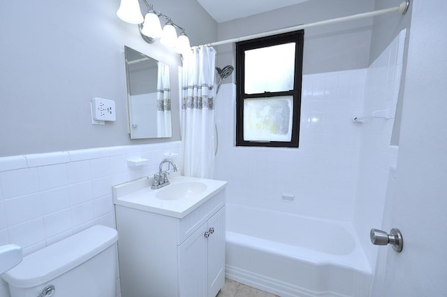 66 Rockledge Rd Unit 1B, Hartsdale, NY 10530 - full bathroom featuring toilet, vanity, shower / bath combo with shower curtain, and tile walls