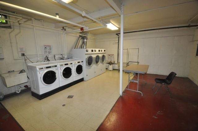 66 Rockledge Rd Unit 1B, Hartsdale, NY 10530 - common laundry area featuring separate washer and dryer, a sink, and concrete block wall