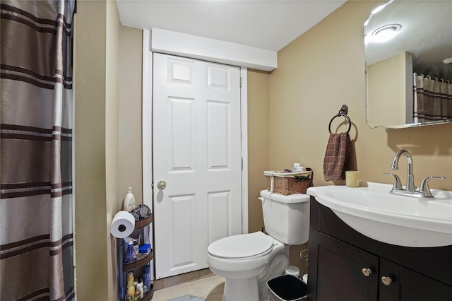 bathroom featuring tile patterned floors, curtained shower, toilet, and vanity