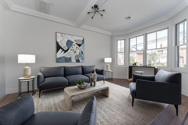 357 Westwood Rd, Woodmere, NY 11598 - living room with healthy amount of natural light, wood finished floors, baseboards, and ornamental molding
