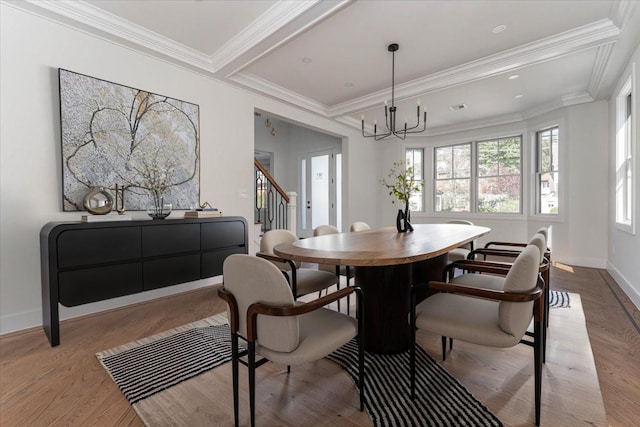 357 Westwood Rd, Woodmere, NY 11598 - dining room with a chandelier, stairway, baseboards, wood finished floors, and crown molding