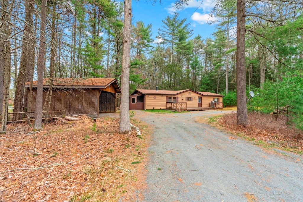 3 Curtis Rd, Eldred, NY 12732 - view of front facade featuring a wooden deck and driveway