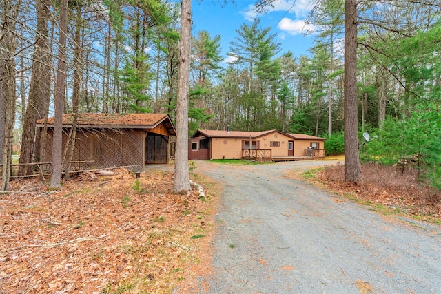 3 Curtis Rd, Eldred, NY 12732 - view of front facade featuring a wooden deck and driveway