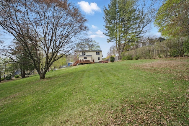 view of yard featuring a deck