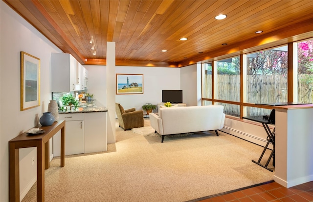 living room with wood ceiling, carpet flooring, recessed lighting, baseboard heating, and baseboards