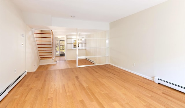 52 Round Hill Rd, Dobbs Ferry, NY 10522 - unfurnished living room featuring baseboards and a baseboard radiator