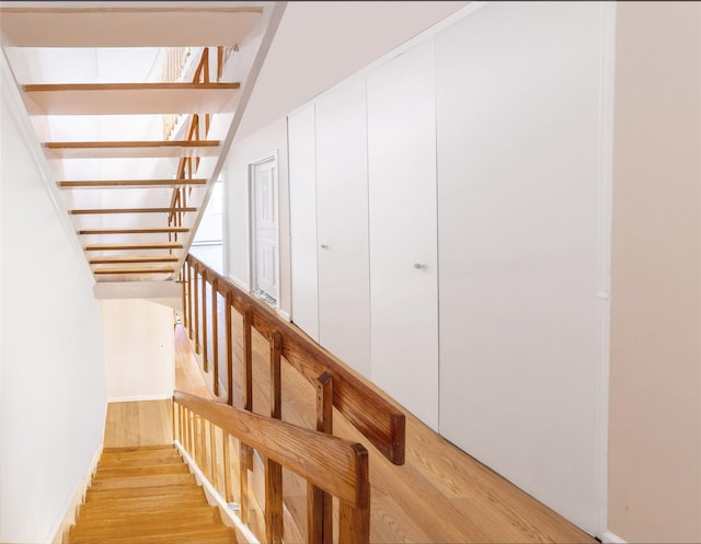 52 Round Hill Rd, Dobbs Ferry, NY 10522 - stairs featuring wood finished floors