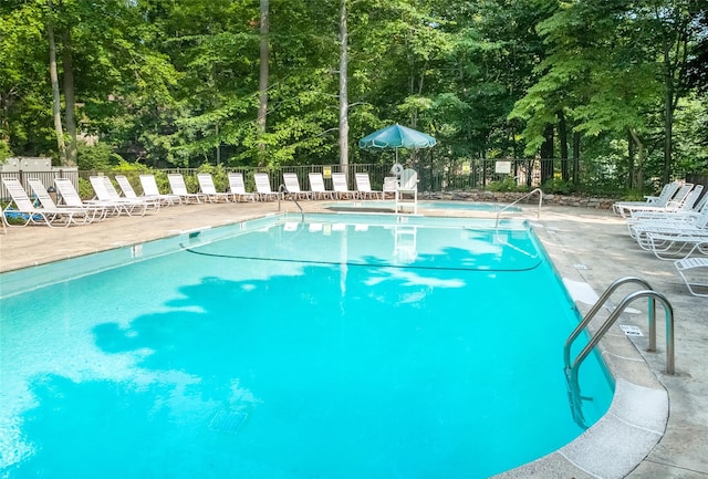 52 Round Hill Rd, Dobbs Ferry, NY 10522 - pool with a patio area and fence
