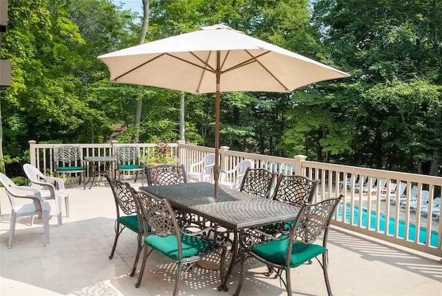 52 Round Hill Rd, Dobbs Ferry, NY 10522 - view of patio / terrace with outdoor dining space and an outdoor pool