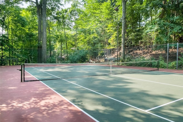 52 Round Hill Rd, Dobbs Ferry, NY 10522 - view of tennis court with fence and community basketball court