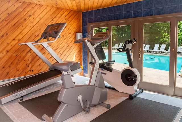52 Round Hill Rd, Dobbs Ferry, NY 10522 - workout room featuring wooden ceiling, tile patterned floors, plenty of natural light, and french doors