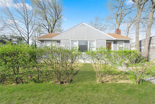 16 Alberta Ave, Staten Island, NY 10314 - exterior space with a chimney and a lawn