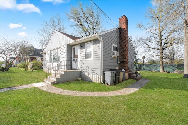 16 Alberta Ave, Staten Island, NY 10314 - exterior space featuring a chimney and a front lawn