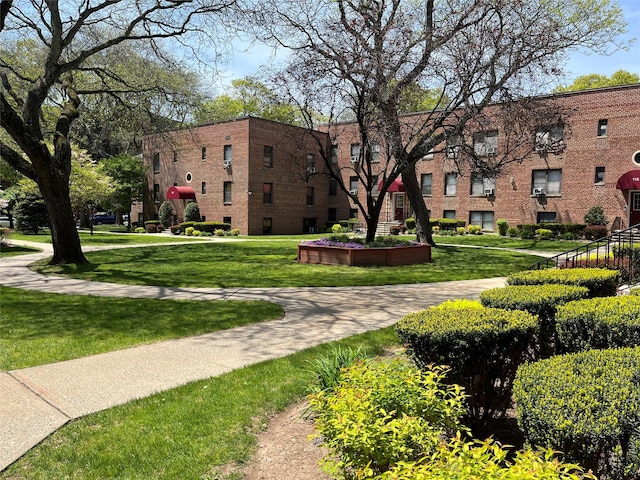 view of community with a lawn