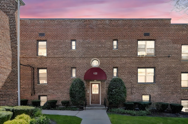 view of front facade with brick siding