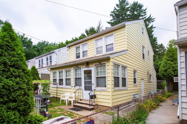 6 Walnut Pl, Great Neck, NY 11021 - traditional-style home featuring entry steps and fence