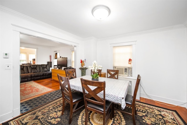 6 Walnut Pl, Great Neck, NY 11021 - dining area with wood finished floors, crown molding, and cooling unit