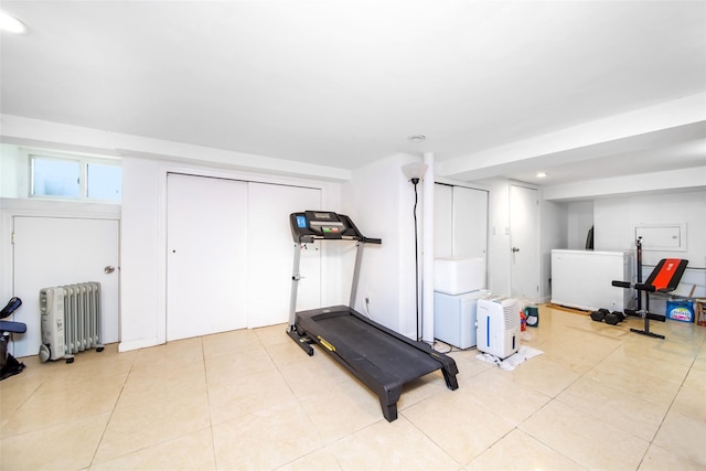 6 Walnut Pl, Great Neck, NY 11021 - workout area with light tile patterned flooring and radiator
