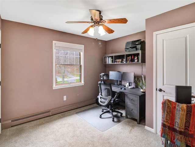 carpeted office with baseboard heating, baseboards, and ceiling fan