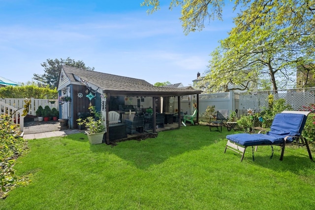 view of yard featuring a fenced backyard