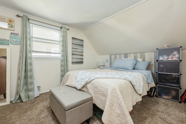 bedroom featuring carpet flooring, crown molding, and vaulted ceiling