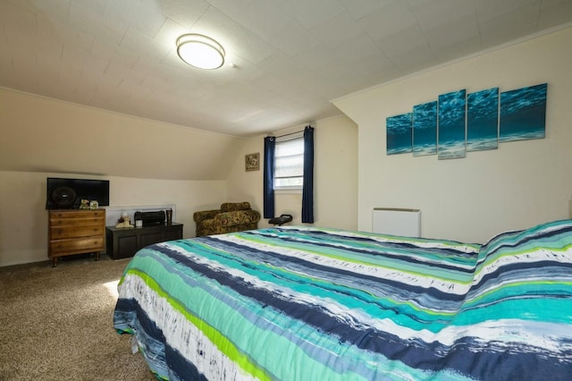 carpeted bedroom featuring vaulted ceiling
