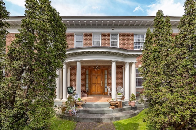 1271 Beverly Rd, Douglaston, NY 11363 - view of exterior entry with brick siding and covered porch