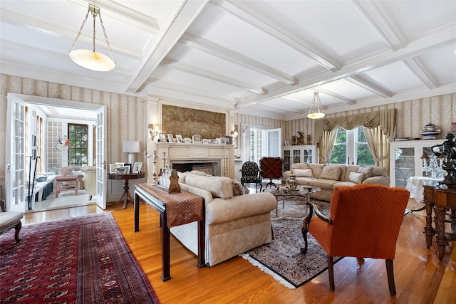 1271 Beverly Rd, Douglaston, NY 11363 - living room with light wood finished floors, wallpapered walls, a fireplace, and coffered ceiling