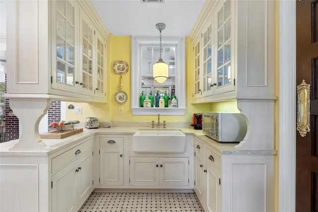 1271 Beverly Rd, Douglaston, NY 11363 - bar featuring hanging light fixtures, a sink, white microwave, and visible vents