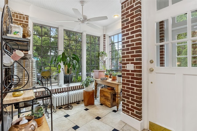1271 Beverly Rd, Douglaston, NY 11363 - sunroom with radiator, tile patterned floors, and ceiling fan