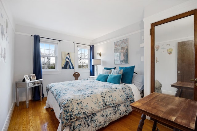 1271 Beverly Rd, Douglaston, NY 11363 - bedroom featuring wood finished floors and baseboards