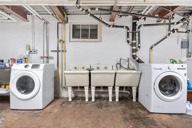 1271 Beverly Rd, Douglaston, NY 11363 - washroom featuring washer and dryer, a sink, and laundry area