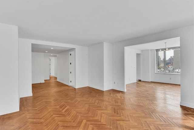 90 E End Ave Unit 10B, New York Manhattan, NY 10028 - spare room featuring baseboards, recessed lighting, and a chandelier