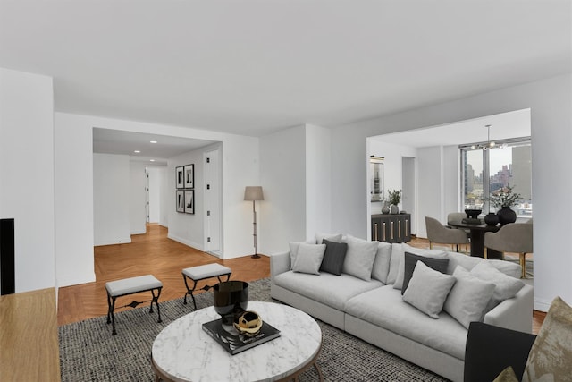 90 E End Ave Unit 10B, New York Manhattan, NY 10028 - living area with wood finished floors, recessed lighting, baseboards, and a chandelier