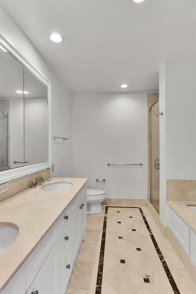 90 E End Ave Unit 10B, New York Manhattan, NY 10028 - full bathroom with a shower stall, recessed lighting, toilet, a garden tub, and double vanity