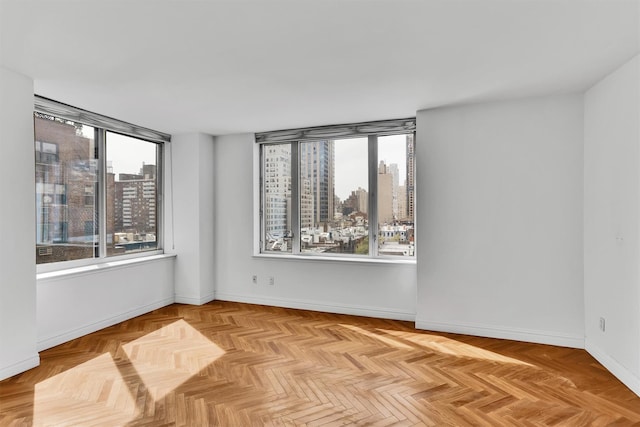 90 E End Ave Unit 10B, New York Manhattan, NY 10028 - spare room with a view of city and baseboards