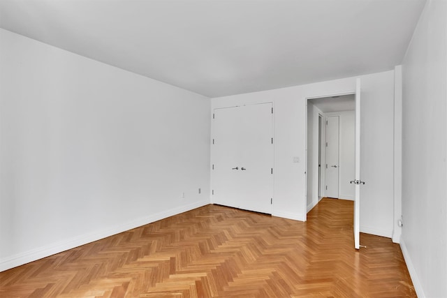 90 E End Ave Unit 10B, New York Manhattan, NY 10028 - unfurnished bedroom featuring baseboards