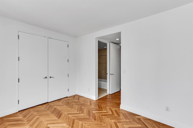 90 E End Ave Unit 10B, New York Manhattan, NY 10028 - unfurnished bedroom with baseboards, recessed lighting, a closet, and ensuite bathroom