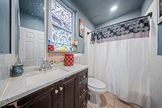 3219 104th St, East Elmhurst, NY 11369 - full bath featuring vanity, tile patterned flooring, toilet, tile walls, and a shower with curtain