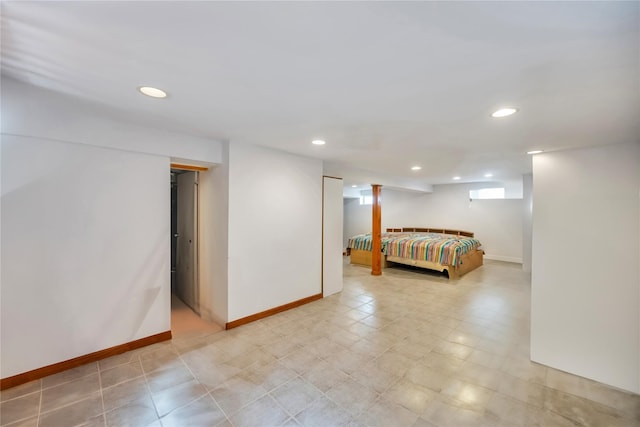bedroom with recessed lighting and baseboards