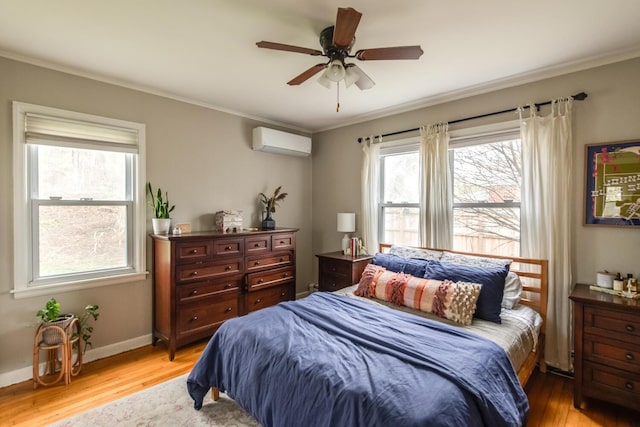 37 Rural Ave, Wingdale, NY 12594 - bedroom with crown molding, a wall mounted AC, and light wood-style flooring