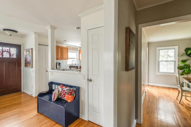 37 Rural Ave, Wingdale, NY 12594 - foyer with baseboards, ornamental molding, and light wood-style flooring