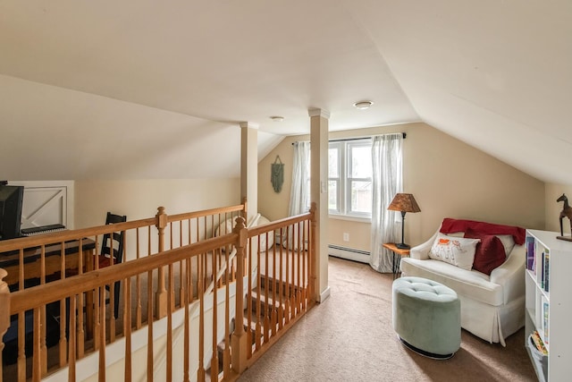 37 Rural Ave, Wingdale, NY 12594 - living area with vaulted ceiling, baseboard heating, carpet flooring, and an upstairs landing