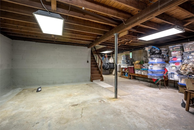 24 Briarbrook Rd, Ossining, NY 10562 - unfinished below grade area featuring stairway and concrete block wall