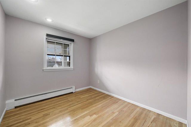 125 Lakewood Dr, Congers, NY 10920 - unfurnished room with a baseboard heating unit, wood finished floors, and recessed lighting